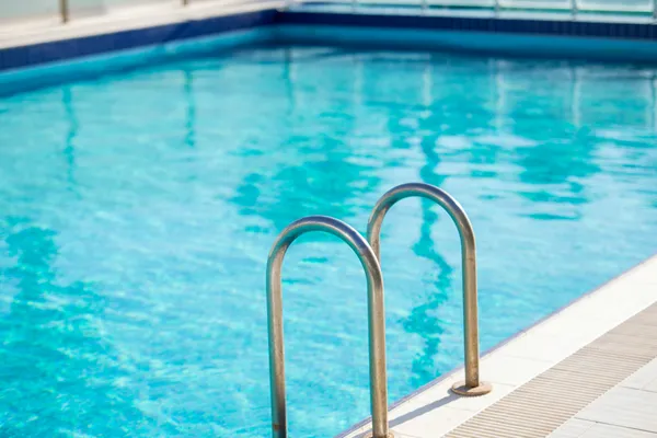 Safe swimming pool with steps and compliant safety features